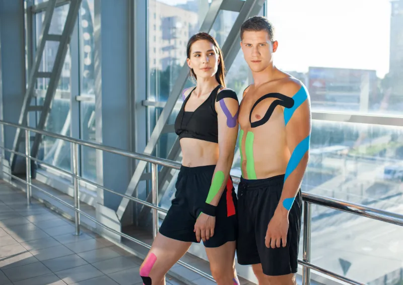 young sports couple with kinesiological taping pos 2023 11 27 05 09 02 utc